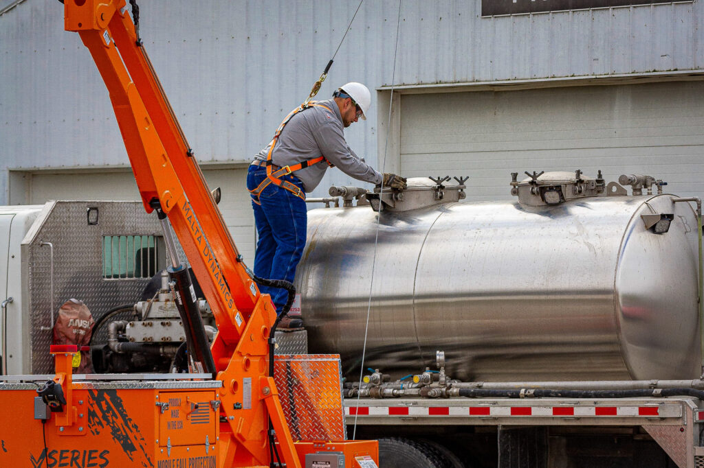 man working in oilfield industry
