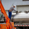 man working in oilfield industry